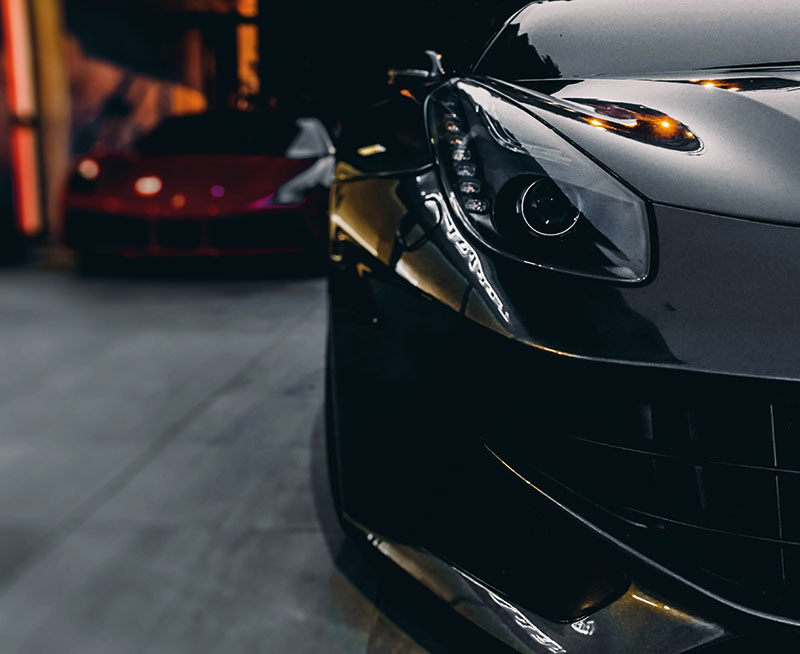 Performance cars in a valet garage